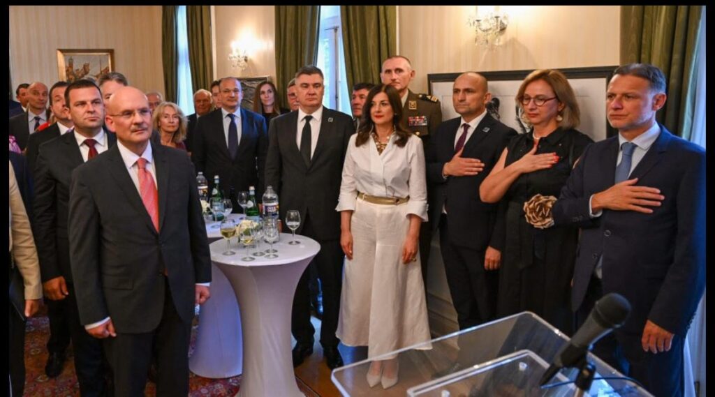 President Milanovic, First Lady Sanja Music Milanovic, and a Cabinet member standing for both the Croatian and American National Anthems – photo from the Office of the President of the Republic of Croatia/ Filip Glas